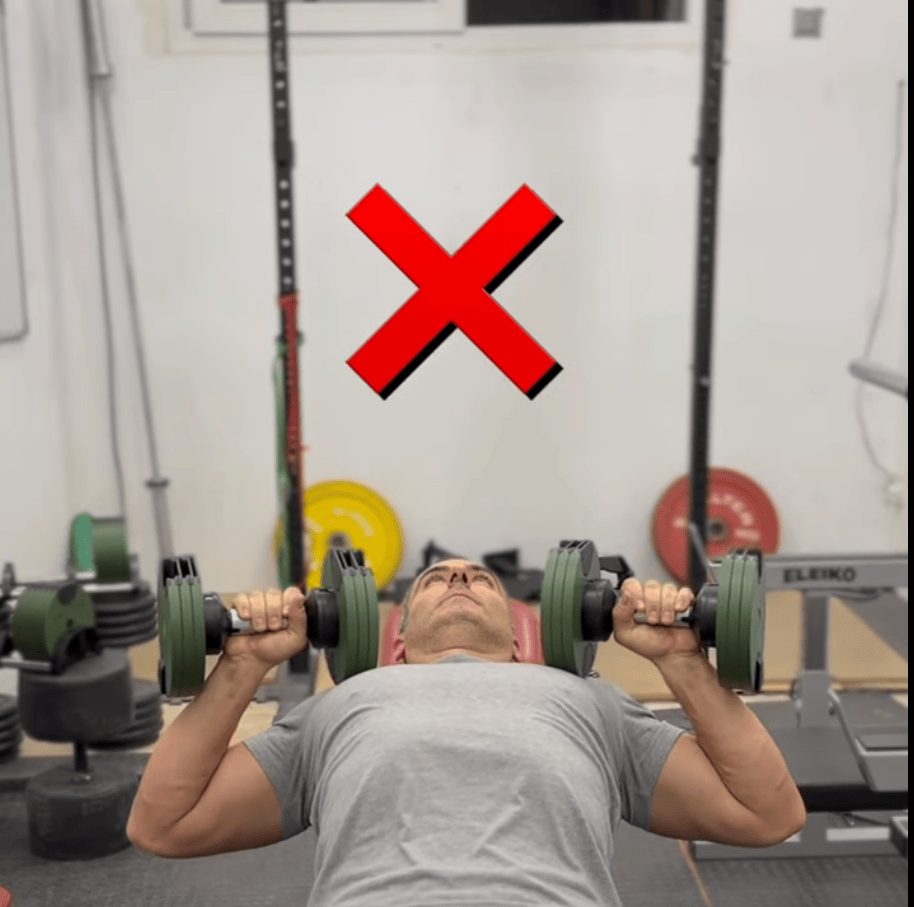 Incorrect posture for chest training with dumbbells